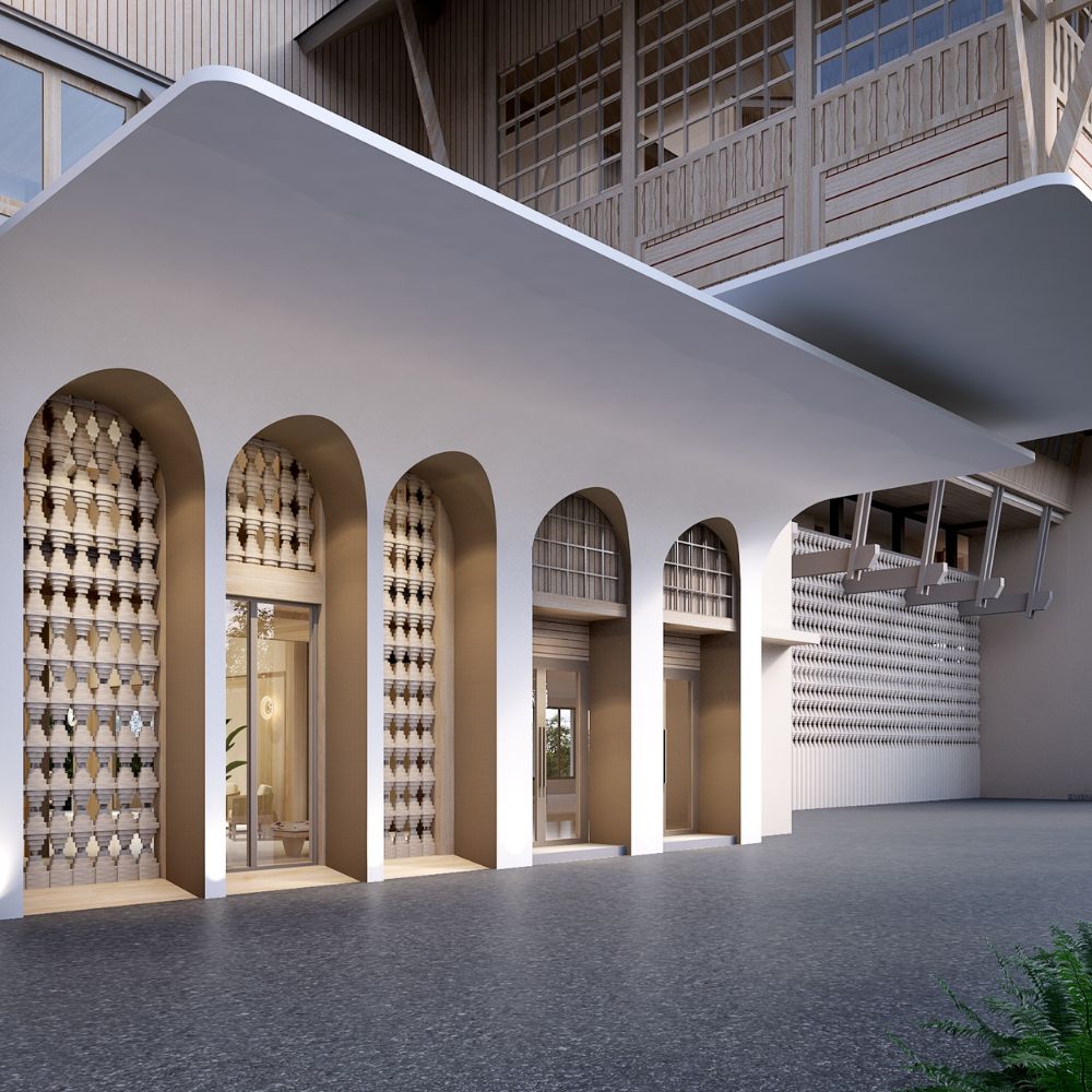 Beachfront wellness resort designed by Openbox Architects featuring a bright open lobby with ocean views, natural light through glass roof, and warm coastal materials.