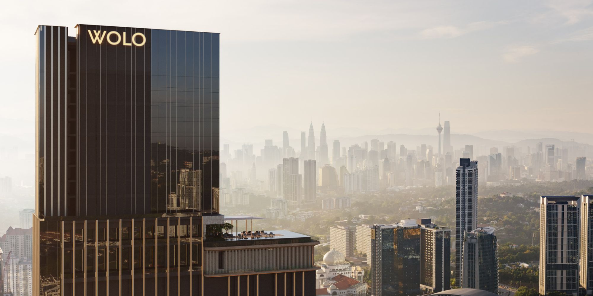 Architectural facade of WOLO in Kuala Lumpur featuring vertical clay inspired panels, soft curved textures, and a modern high rise form that reflects the city’s layered earth, cultural diversity, and fluid design concept by Openbox Architects.
